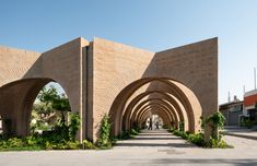 an arch in the middle of a brick building