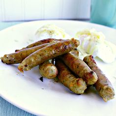 there are sausages and eggs on the plate