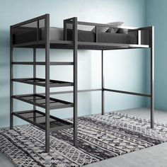 a bunk bed sitting on top of a rug next to a blue wall and floor