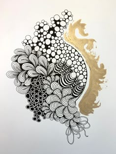 an abstract painting with black and gold paint on white paper, depicting a peacock's tail