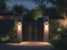 an entrance to a home at night with two lights on the door and one light on the wall