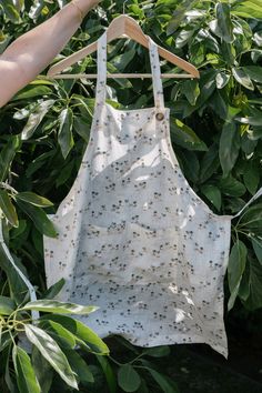 Serve your guests in style with our new linen apron. Pairs perfectly with our linen tablecloths and napkins. Lemon Clothing, Caged Sandals, Black Aviators, Summer Linen, Neon Purple, Linen Apron, Linen Tablecloth, Sustainable Clothing, Mango Wood