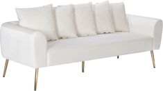 a white couch with five pillows on it's back and four legs, against a white background