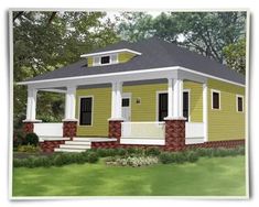 a small yellow and white house with porches