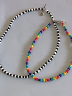 multicolored beaded necklace on white background