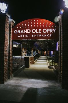 an entrance to the grand olee opry at night