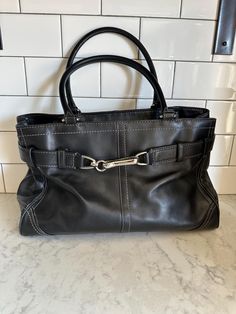 VTG Coach Black leather Hampton handbag.  Great vintage condition! Does have some damage at the base of one handle and a tiny white spot!  Please see pics for more condition details. No odors. The crossbody strap is not included. Measures:13" wide x 9" tall x 5.5 deep. Free domestic shipping! Top Handle Bags, School Bag, Handbag Purse, Crossbody Strap, The Hamptons, Purses And Handbags, Top Handle, High Fashion, Leather Bag