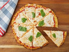 the pizza is cut into eight pieces and ready to be served with a serving knife