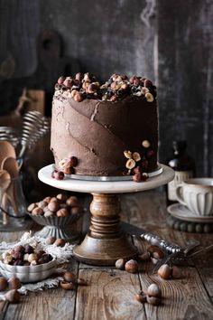 a chocolate cake sitting on top of a wooden table