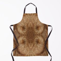 an apron with a brown and black pattern on the front that is made up of wavy hair