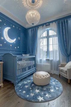 a baby's room decorated in blue and white with stars on the ceiling, crib, rocking chair, bed, and chandelier