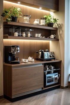 a coffee bar with pots and cups on it