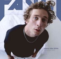 a young man with curly hair on the cover of faq magazine