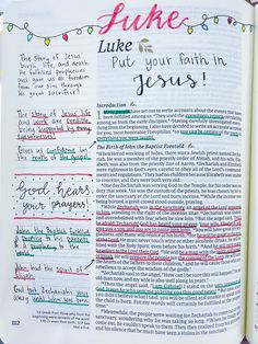 an open bible with handwritten words and christmas lights on the page, which has been written in different languages