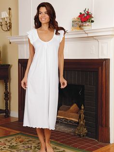 A gown that pampers you so much it makes you feel as precious as it makes you look. Hand made in Peru, with rufflely smocked and embroidered shoulders of feminine charm, it caresses your body with the unimaginable softness of White pima cotton jersey. (Almost like having loving arms around you.) Luxury Nightwear, Cotton Nightgown, Luxury Linen, Nightgowns, Short Long, Lingerie Fashion, Pima Cotton, Night Dress, Nightwear