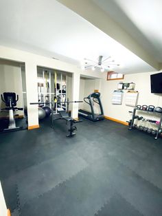 Like most of my home DIY projects, the goal is to create something useful and not spend a lot of money.  Here is how I created a DIY home gym on a dime. Home Gym Diy, Home Gym Corner, Gym Corner, Gym Basement, Home Gym Basement, Diy Mirror Wall, Pretty Preppy, Workout Room Home, False Wall