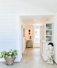 the hallway is clean and ready for us to use as an entrance way into the house