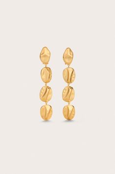 A gold-tone drop earring with molded coins and a clip and post backing. — Gold toned — Drop earrings — Molded coins — Omega clip post backing Cult Gaia, Drop Earring, Brushed Brass, Lifestyle Brand, Clothing For Women, Gold Tones, Brass, Drop Earrings, Gold