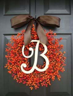 a wreath with the letter b on it