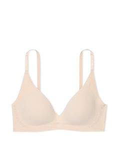 Get the comfort and support you want—minus the wires—in this ultra-soft style featuring push-up padding for the lift and shape you love and soft silicone strips for support and hold. Lift & Lining Push-up padding adds up to 1 cup size Wireless Silicone support technology on band and wings Straps & Hooks Back hook-and-eye closures Smooth back Adjustable logo straps Details & Fabric V-neck silhouette Hand wash Imported Push Up Pads, Buy Tshirts, Faded Denim, Victoria Secret Bras, Love Is Free, Bra Women, Cup Size, Soft Style, 1 Cup