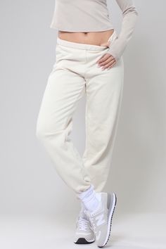 Get ready to bee-lieve in comfort with our Honey Mid-Rise Oversized Joggers. These joggers offer an oversized fit that is perfect for any yoga or fitness routine. The mid-rise design provides a flattering and secure fit, so you can work out with confidence. Don't let anything hold you back, buzz into action with our joggers! Sporty Full-length Spring Joggers, Sporty Full Length Spring Joggers, Oversized Cotton Sporty Joggers, Athleisure Baggy Sweats With Elastic Waistband, Baggy Sporty Sweats For Loungewear, Soft Relaxed Fit Sweatpants For Loungewear, Oversized Comfortable Joggers With Ribbed Waistband, Oversized Joggers With Ribbed Cuffs For Loungewear, Relaxed Fit Joggers For Loungewear