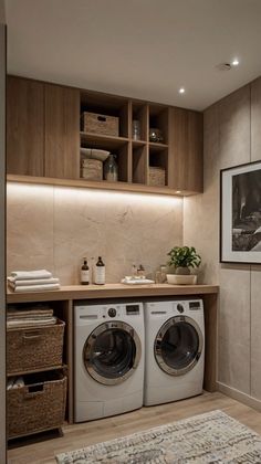 a washer and dryer in a room with wooden shelves on either side of the washer