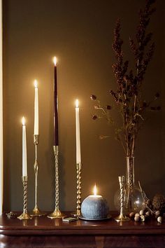 candles and vases on a table with text overlay that reads shop decorative accessories