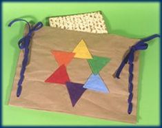 a brown paper bag with colorful shapes on it