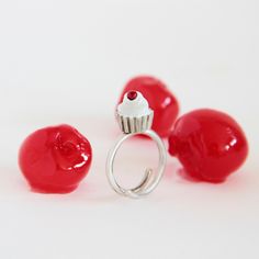 "Silver ring in the shape of a cupcake. The cupcake is enameled in white and red. The ring is very realistic, it almost looks like one just taken from the oven. This Adjustable is available in two sizes: Small- from the US size 5,5 to 7 (10 to 14 spanish size) Medium - from the US size 7,5 to 9 (14 to 19 spanish size) Large - from the US size 9 to 11 /19 to 24 spanish size) This design belongs to the \"Salado\" collection (\"Salty\" collection) NOTE ➤ All our designs are handmade, the color may Cherry Ring, Cupcake Ring, 5 To 7, The One Show, Original Jewelry, Diy Schmuck, Enamel Jewelry, White And Red, Ring Silver