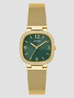 Gold-tone and green analog watch Gold-tone case Crystal-encrusted cushion bezel Sleek green dial Quarterly numeral digits and line hour markers Gold-tone mesh bracelet Deployment buckle closure Case diameter in mm: 32 Water resistant up to 30M/100 ft Two-year limited warranty Green Watches With Rectangular Dial And Analog Display, Formal Green Diamond Watch With Round Dial, Green Watches With Diamond Hour Markers, Timeless Green Watch With Diamond Hour Markers, Formal Green Watches With Diamond Hour Markers, Emerald Watch, Green Watch, Mesh Bracelet, Stainless Steel Mesh