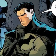 a man in a batman costume with a speech bubble above his head and the words superman written below him