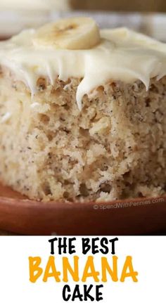 the best banana cake with cream cheese frosting is on a brown plate and there are bananas in the background