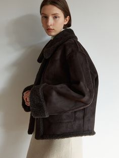 Editor's notesThis is a reversible stand collar wool half fur coat. This coat has great quality wool material but is a very light weight design and other side is made with tone on tone matte eco suede material. It has a relaxed silhouette but also having a casual mood as well.- Reversible stand collar half fur coat- One side is made of wool and other side made of suede matte- Relaxed comfortable silhouette- Side pockets on both sides and is light weightMeasurements(in.)S / M- Shoulder: 22.83 in. Leather And Wool Jacket, Winter Coat Women 2024, Wool Outerwear With Padded Collar, Casual Wool Half-zip Outerwear, Oversized Collared Wool Outerwear, Winter Coat Aesthetic, Short Winter Coat, English Lifestyle, Coats 2024