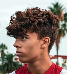 Thick Curly Fringe with Classic Taper - Check out the best haircuts for men to find cool styles and fresh cuts. These stylish men's hairstyles will transform your look! #menshaircuts #menshair #fade Low Bald Fade, Short Comb Over, Short Quiff, Best Haircuts For Men, Curly Fringe, High Skin Fade, Curly Hair Fade, Classic Taper, Popular Mens Hairstyles