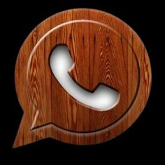 a wooden speech bubble with a white phone on it's side and a black background