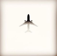 an airplane is flying in the sky with small dots on it's wings and landing gear