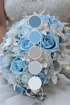 a bridal bouquet with blue roses and silver accents