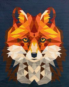 a quilt with an image of a fox on it