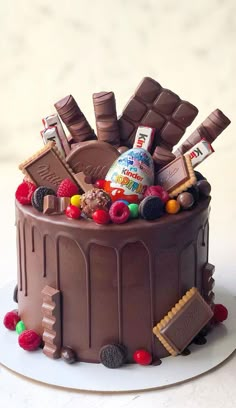 a chocolate cake with candy and candies on top