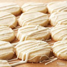 iced cookies with icing on a wooden surface