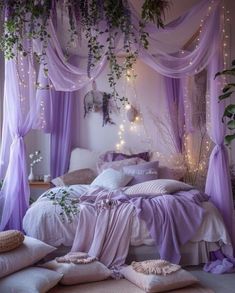 a bedroom decorated in lavender and white with lots of plants hanging from the ceiling over the bed