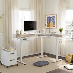 a home office with two computer desks and a chair in front of the window