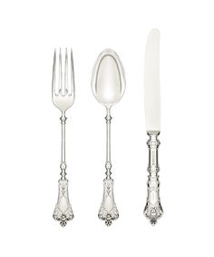 an assortment of silverware including forks, knives and spoons on a white background