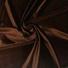 a close up shot of a dark brown fabric