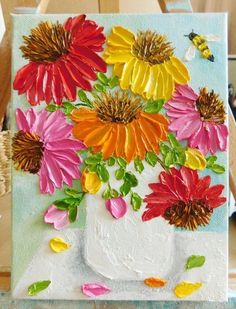 a painting of colorful flowers in a white vase