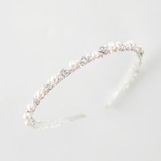 This chic bridal headband beautifully suits a range of wedding hairstyles. The wedding halo headpiece is super versatile and shapes easily into many hairstyles. This is a stunning pearl hair piece with some sparkle and perfect for the modern ethereal bride wanting to add glamour to the whimsy. MATERIALS: This exquisite crystal head piece is made with freshwater pearls and shiny Cubic zirconia crystals or rhinestones. You can choose a matching pair of wedding earrings here https://etsy.me/3ouSsVy Bridal Hairstyle Headband, Pearl Headband Wedding Hair Down, Bridal Pearl Headband, Simple Pearl Headband Wedding, Bridal Headband Pearl, Wedding Halo Headpiece, Pearl And Diamond Headband, Pearl Headpiece Wedding, Ethereal Bride