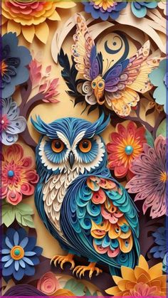 an owl with colorful flowers on it's head is shown in this paper cutout