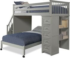 a bunk bed with a desk underneath it and drawers below the bed, along with a pull out trundle