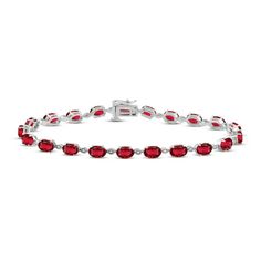 Delightfully vivid, this beautiful bracelet features multiple oval lab-created rubies in a lovely sterling silver setting. The chain bracelet measures 7 1/2 inches and secures with a tongue clasp. Red Oval Tennis Bracelet Fine Jewelry, Oval Ruby Gemstone Tennis Bracelet, Red Oval Fine Jewelry Tennis Bracelet, Red Oval Diamond Gemstone Bracelet, Red Oval Diamond Classic Bracelet, Red Oval Tennis Bracelet For Anniversary, Red Oval Classic Diamond Bracelet, Classic Red Oval Diamond Bracelet, Classic Sterling Silver Oval Gemstone Bracelet