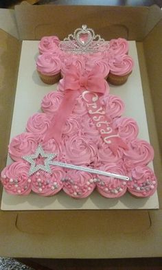 a princess dress shaped cupcake cake in a box